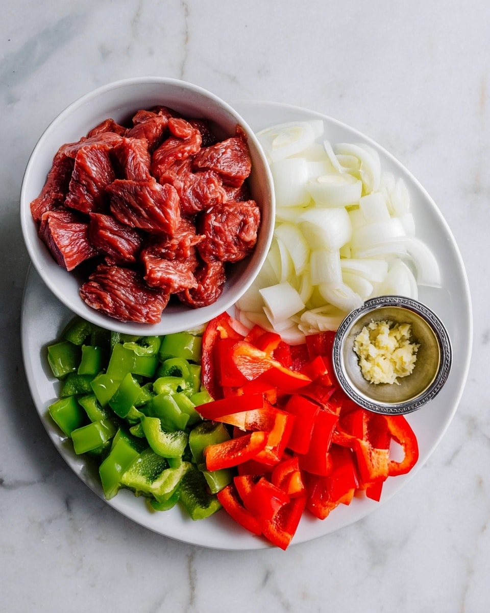 A bowl on the left filled with raw red meat pieces, showing a rough texture and rich color. On the right, a white plate has three sections: sliced white onions at the top, chopped green bell peppers in the middle, and red bell peppers at the bottom, each layer showing fresh and bright colors with clear edges. A small silver bowl with minced garlic sits on the plate near the onions. All placed on a white marbled surface. Photo taken with an iphone --ar 4:5 --v 7