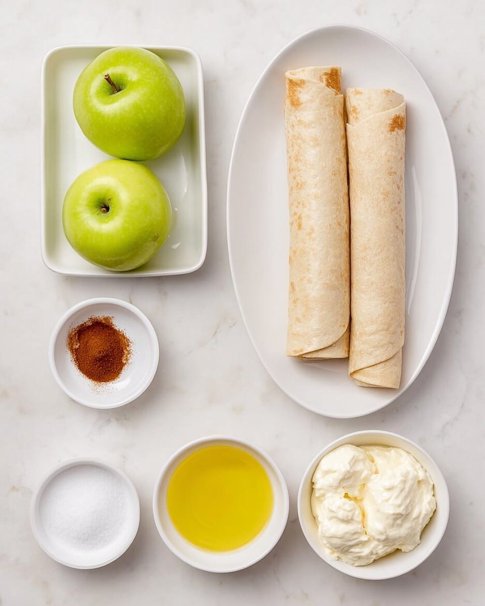The image shows a white oval plate with two light tan rolled tortillas placed side by side near the top right. To the left of this plate, there is a white square dish holding two green apples side by side, both shiny and smooth. Below these dishes are five small white dishes arranged loosely; from left to right, the first contains white granulated sugar, the second has a small amount of reddish-brown cinnamon powder, the third is filled with bright yellow melted butter, and the fourth contains several rounded scoops of white cream cheese. All dishes rest on a white marbled background. Photo taken with an iphone --ar 4:5 --v 7