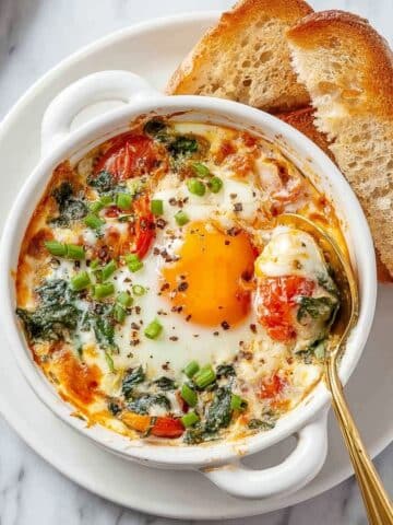 Baked Feta Eggs with Cherry Tomatoes and Spinach Recipe
