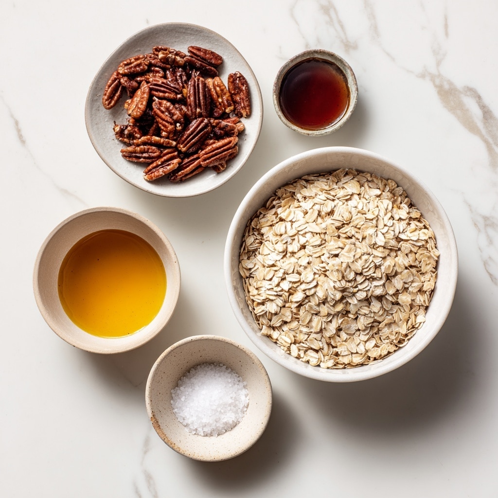 Five white bowls are placed on a white marbled surface. The largest bowl on the right is filled with pale beige whole rolled oats, showing their flat, oval shapes. Below it to the left is a bowl with dark brown shelled pecans with rough textured edges. Above that to the left is a small bowl holding dark amber maple syrup with a shiny surface. Below the pecans is a tiny bowl filled with golden yellow olive oil, its smooth liquid reflecting light. To the right of the olive oil is another small bowl with white salt, fine and powdery in texture. Each bowl is clearly labeled with black text on beige tags. photo taken with an iphone --ar 4:5 --v 7