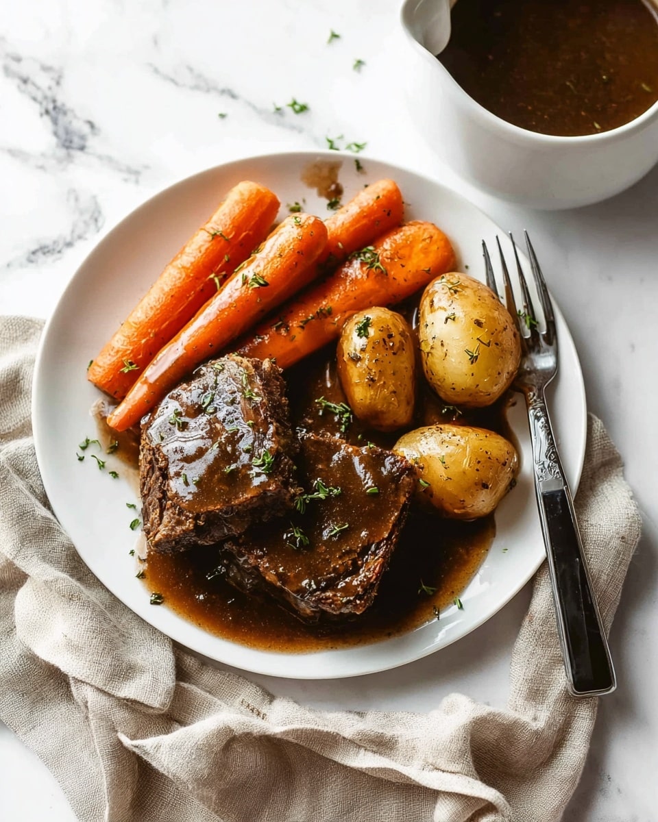 A white plate on a white marbled surface holds two thick pieces of cooked meat covered in dark brown gravy, sprinkled with small green herb bits. Beside the meat are bright orange cooked carrot chunks standing upright, also coated with brown gravy and herbs. Next to the carrots are three golden-brown cooked potatoes, similarly glazed with gravy and herbs. A silver fork with a black handle rests on the right side of the plate. In the background, a white bowl filled with more dark brown gravy sits partially visible. A beige cloth is casually placed to the lower right of the plate. Photo taken with an iphone --ar 4:5 --v 7