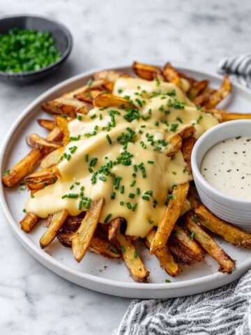Voodoo Fries with Cheddar Cheese Sauce and Cajun Seasoning Recipe