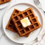 Pumpkin Waffles with Whipped Topping and Chopped Nuts Recipe