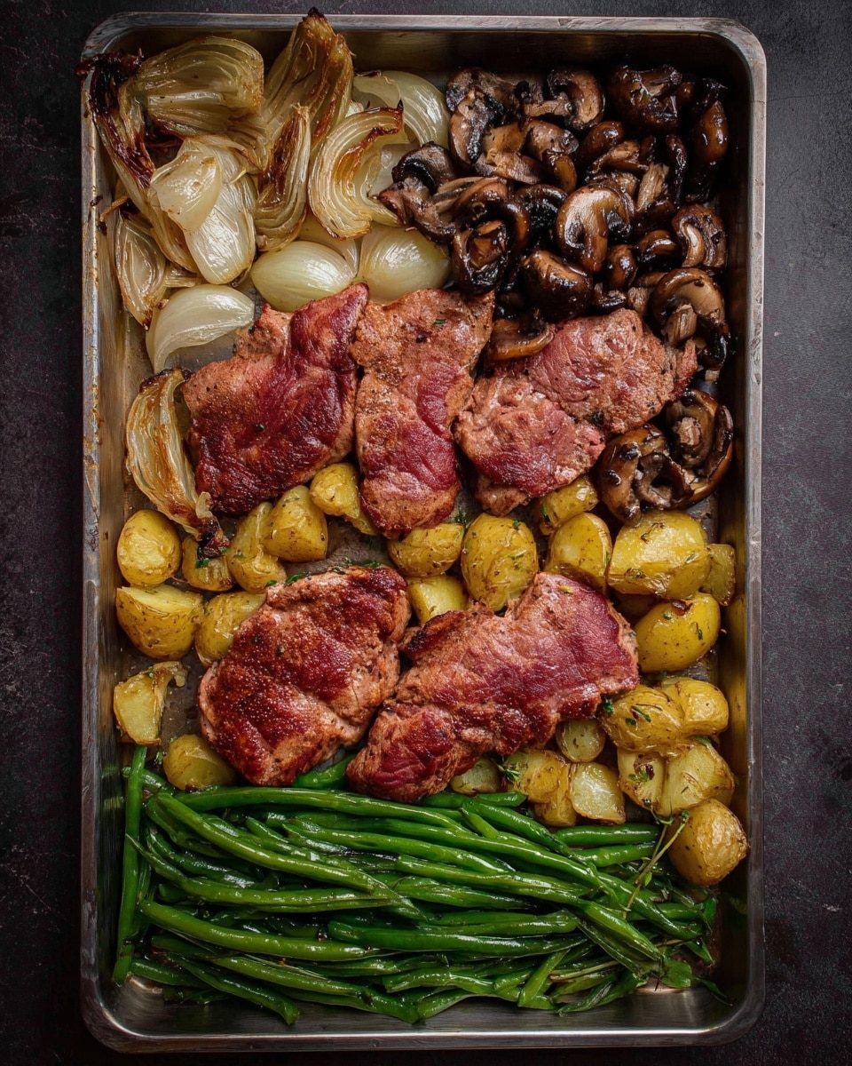 The image shows a metal baking tray filled with cooked food arranged in four sections: the top left corner has light brown onion pieces with slightly charred edges, next to them in the top right corner are small sliced mushrooms in dark brown shades, the bottom right corner holds golden roasted potato chunks, and the bottom left corner has cooked green beans with a fresh green color. Three large, flat, reddish-brown meat pieces with a slightly seared texture lay on top of the vegetables, covering parts of each section. The tray sits on a dark surface. photo taken with an iphone --ar 4:5 --v 7