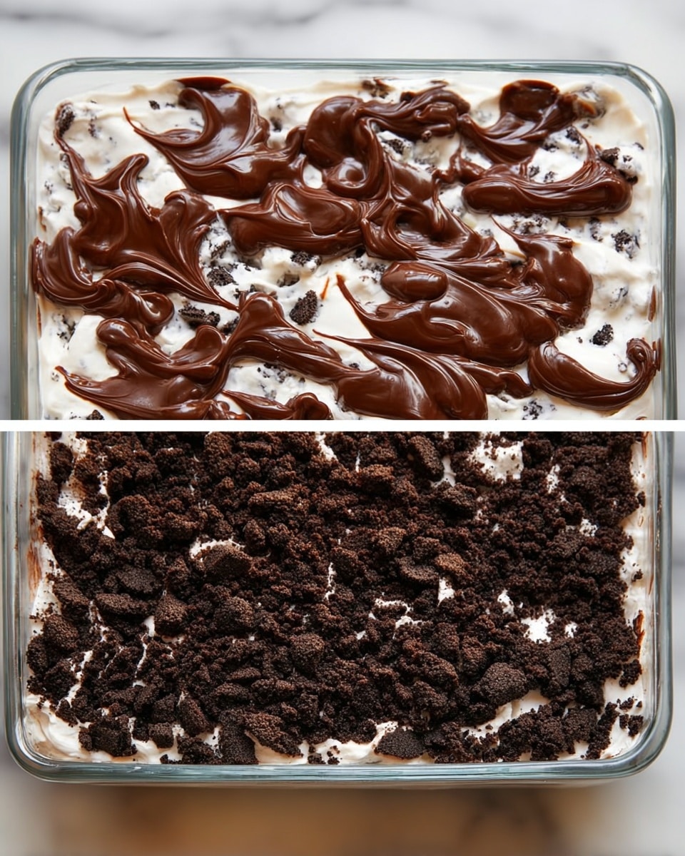 This image shows a two-step dessert in a clear rectangular glass dish. The first layer is at the bottom, made of dark brown, crumbly crushed cookies spread evenly covering the whole dish. The second layer is on top, a white cream with bits of dark cookies mixed in, creating a speckled effect. Over the cream, thick swirls of glossy dark brown chocolate sauce are spread unevenly, giving a textured look. The dish sits on a white marbled surface. photo taken with an iphone --ar 4:5 --v 7