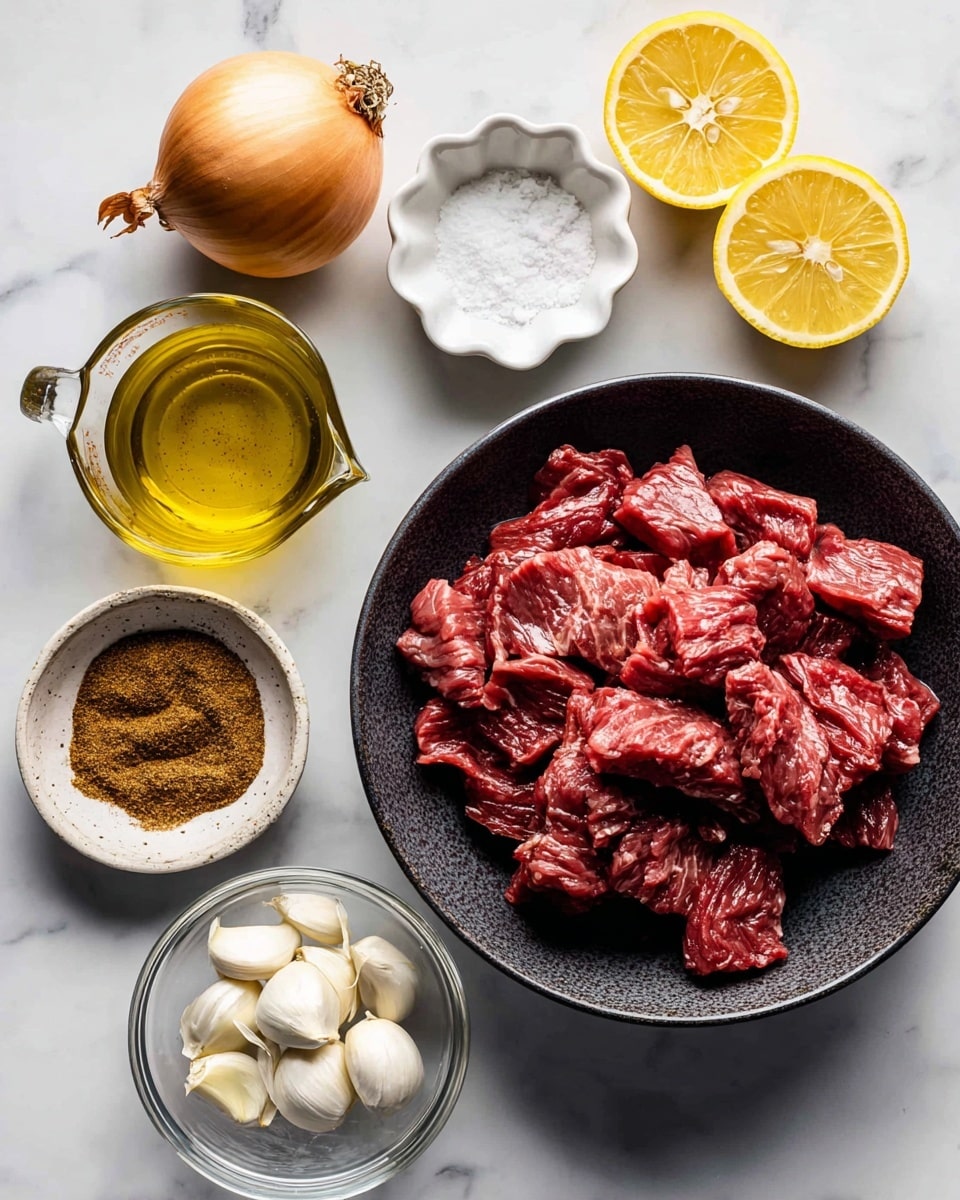 The image shows ingredients arranged on a white marbled surface. In a large dark bowl at the bottom right, there are many pieces of raw red flank steak sliced thinly. To the left of the bowl, a clear measuring cup holds golden olive oil. Above the olive oil is a whole yellow onion with its skin on. Next to the onion, two bright yellow lemon halves sit side by side, showing the juicy interior. Above the lemons, a small white flower-shaped bowl contains coarse white kosher salt. To the right, a plain white round cup holds clear white vinegar. Below the vinegar, a small rustic bowl filled with brown shawarma seasoning powder is placed. Below the seasoning is a small clear glass bowl with several cloves of white garlic. The ingredients are neatly spaced and easy to see, lit with natural light. Photo taken with an iphone --ar 4:5 --v 7