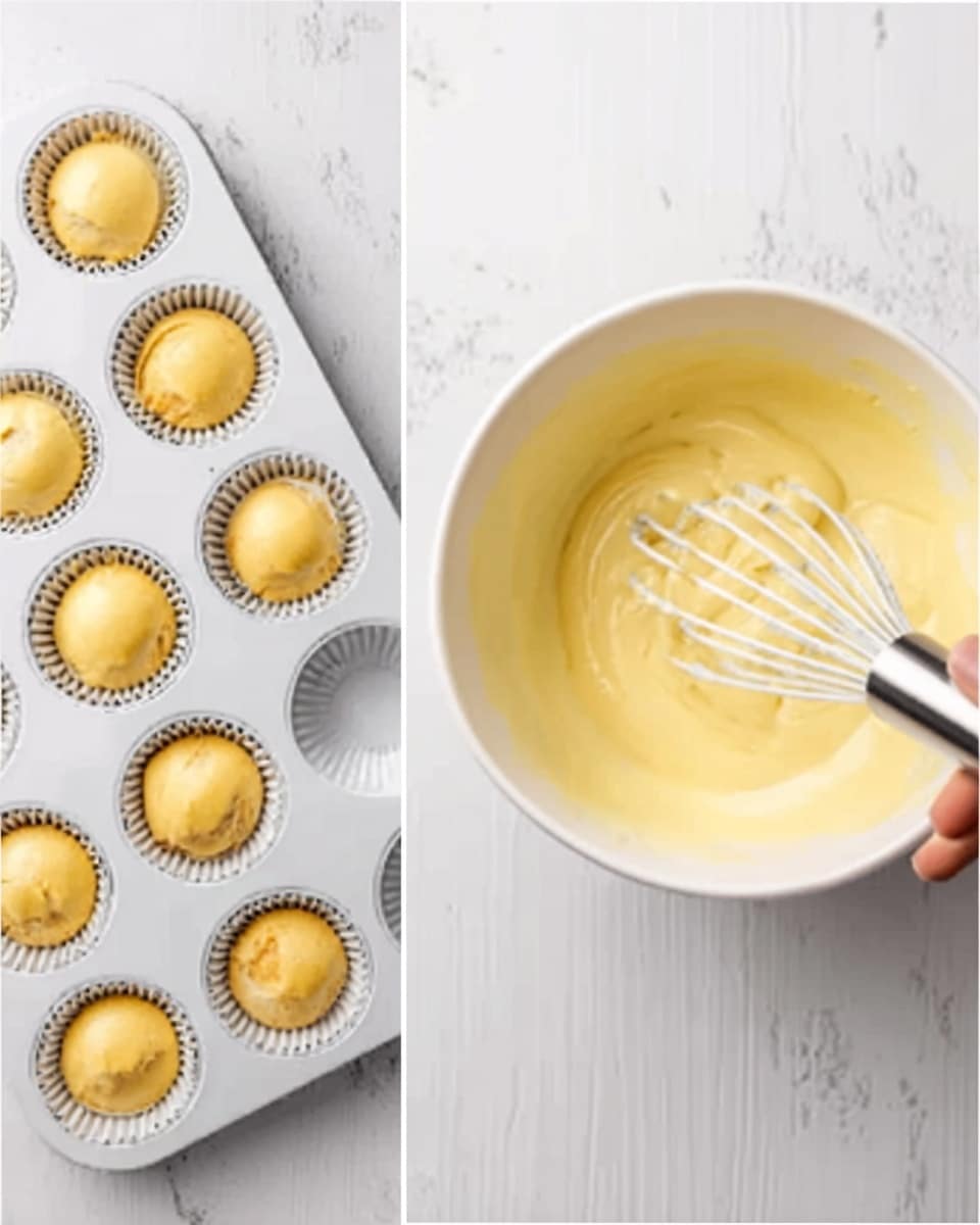 A white bowl filled with a smooth yellow batter with a woman’s hand whisking inside it using a white and silver whisk, next to a white muffin tray holding round, pale yellow dough balls in each cup on a white marbled surface photo taken with an iphone --ar 4:5 --v 7