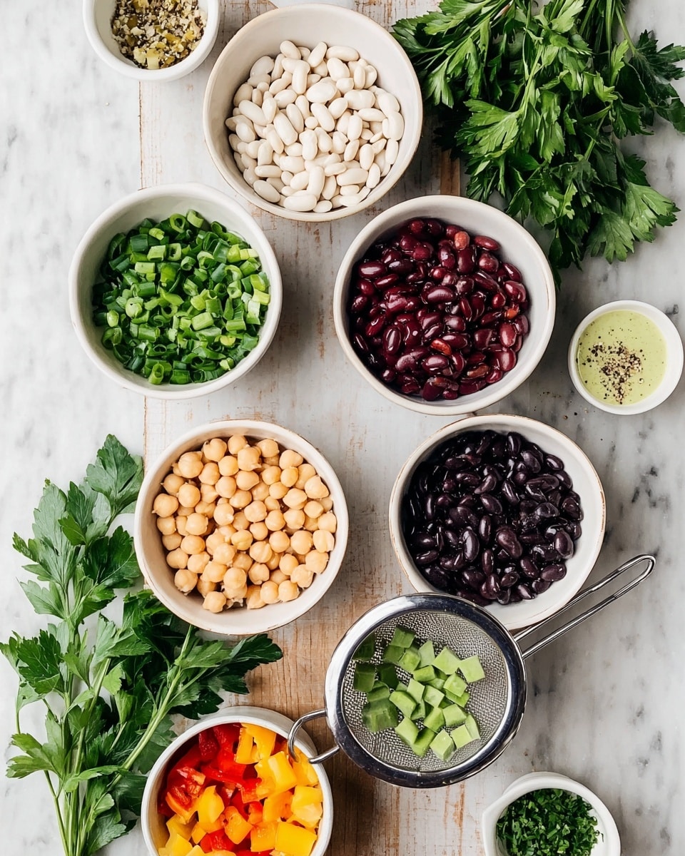 A top-down view of several small white bowls and a colander arranged on a white marbled surface, each filled with different ingredients: bright green chopped scallions in the top left bowl, creamy white beans in the middle left bowl, dark red kidney beans in the middle center bowl, dark black beans below the kidney beans, pale chickpeas in the bottom left bowl, and a mix of finely chopped orange, yellow, and red bell peppers in the small bowl to the right. A small white bowl with light green dressing sprinkled with black pepper is placed near the bell peppers, while a metal colander with cut green beans sits to the right. A bunch of fresh parsley with large green leaves lies at the top center, and chopped parsley is in a small white bowl at the bottom right. photo taken with an iphone --ar 4:5 --v 7