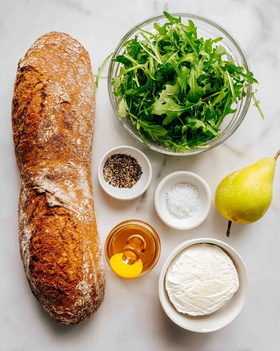 The image shows a fresh sandwich setup on a white marbled surface, featuring a long loaf of whole grain bread with a rough brown crust at the top. Below the bread is a round clear glass bowl filled with dark green arugula leaves, wild and leafy in texture. Next to the bowl is a small white dish containing coarse salt and crushed black pepper in layers. A single yellow-green pear with a smooth skin and small stem is placed near a clear plastic honey bottle with a yellow cap, showing amber honey inside. On the right side, there's a white bowl holding a round, soft white goat cheese with a slightly crumbly texture. The colors include earthy browns, deep greens, creamy whites, and golden amber, all arranged neatly in a bright setting photo taken with an iphone --ar 4:5 --v 7